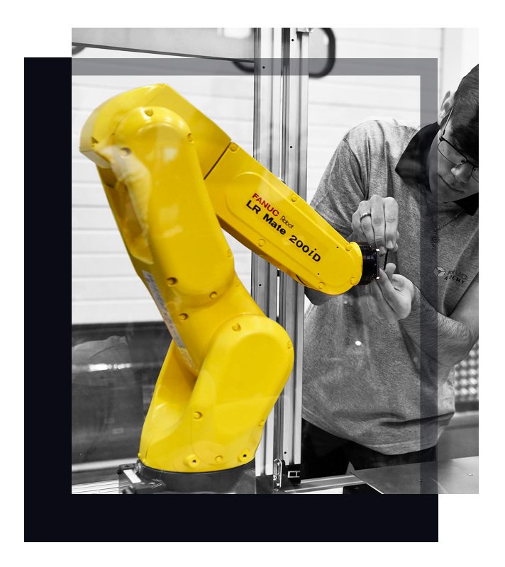 Technician servicing a FANUC LR Mate 200iD robot